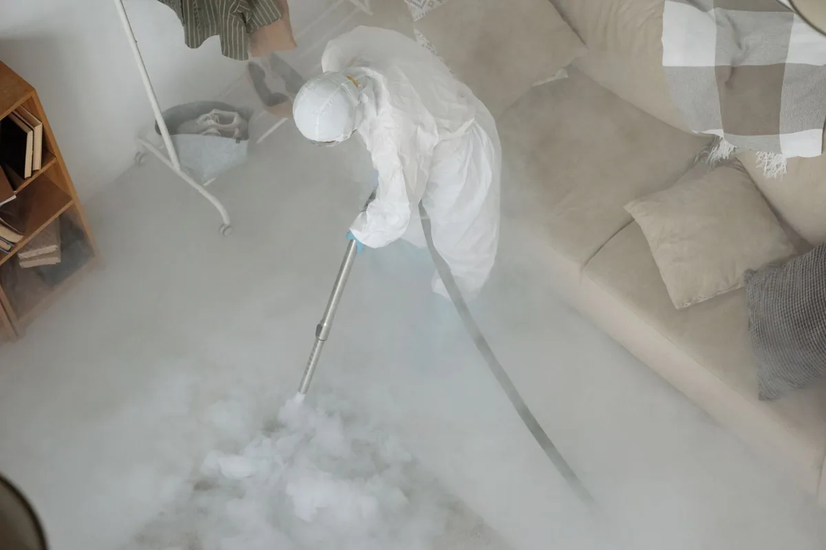 Biohazard cleanup technician in protective equipment, Ellensburg, WA
